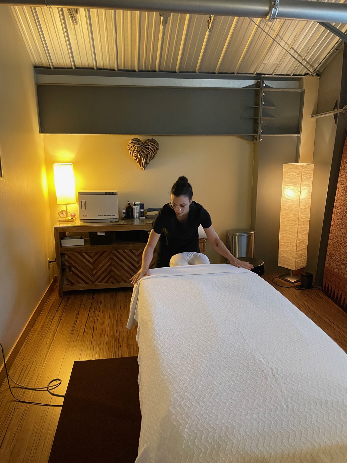 Adriana Hashem giving a therapeutic massage at her Bainbridge Island studio